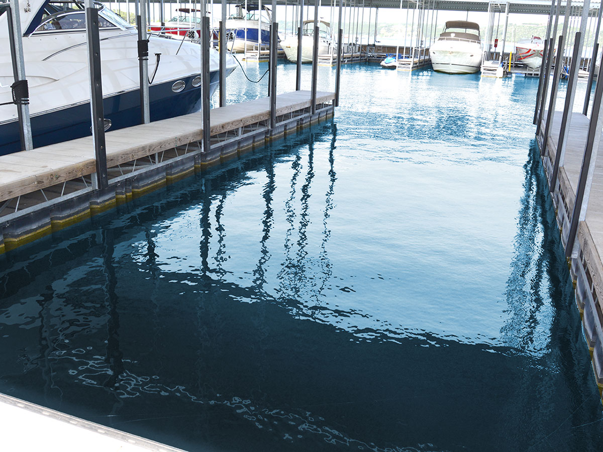 Hydro Lift boat hoists in marina slips